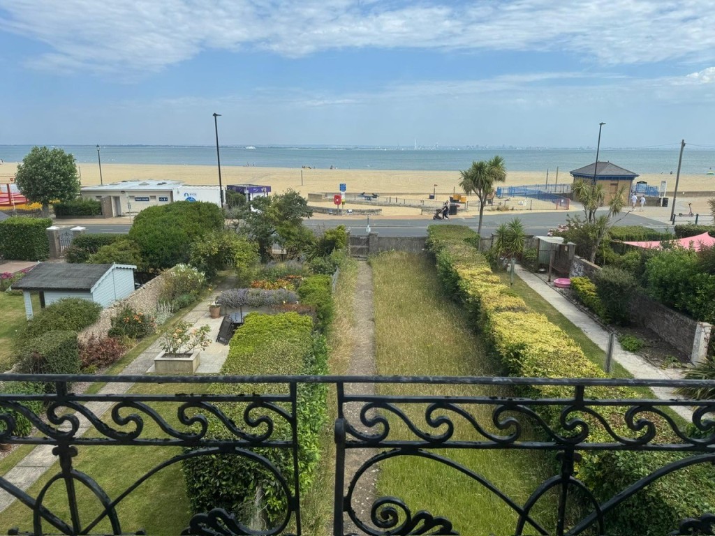 Lot: 81 - FREEHOLD SEAFRONT FIVE STOREY HOME WITH PARKING AND BEAUTIFUL BEACH AND SEA VIEWS - A View from the Kitchen Looking Down the Garden